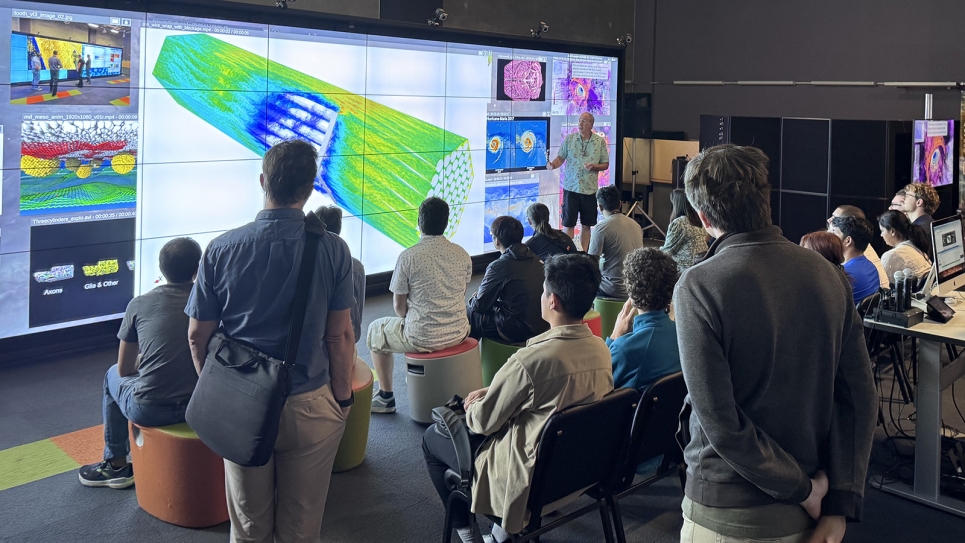 ATPESC 2025 attendees visit the ALCF visualization laboratory
