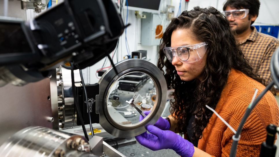 Two scientists using the APS at Argonne.