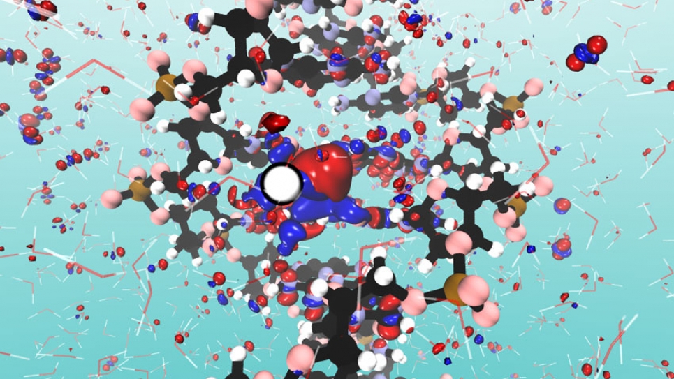A snapshot from non-equilibrium electron dynamics simulationof solvated DNA under proton irradiation. A snapshot from non-equilibrium electron dynamics simulationof solvated DNA under proton irradiation.